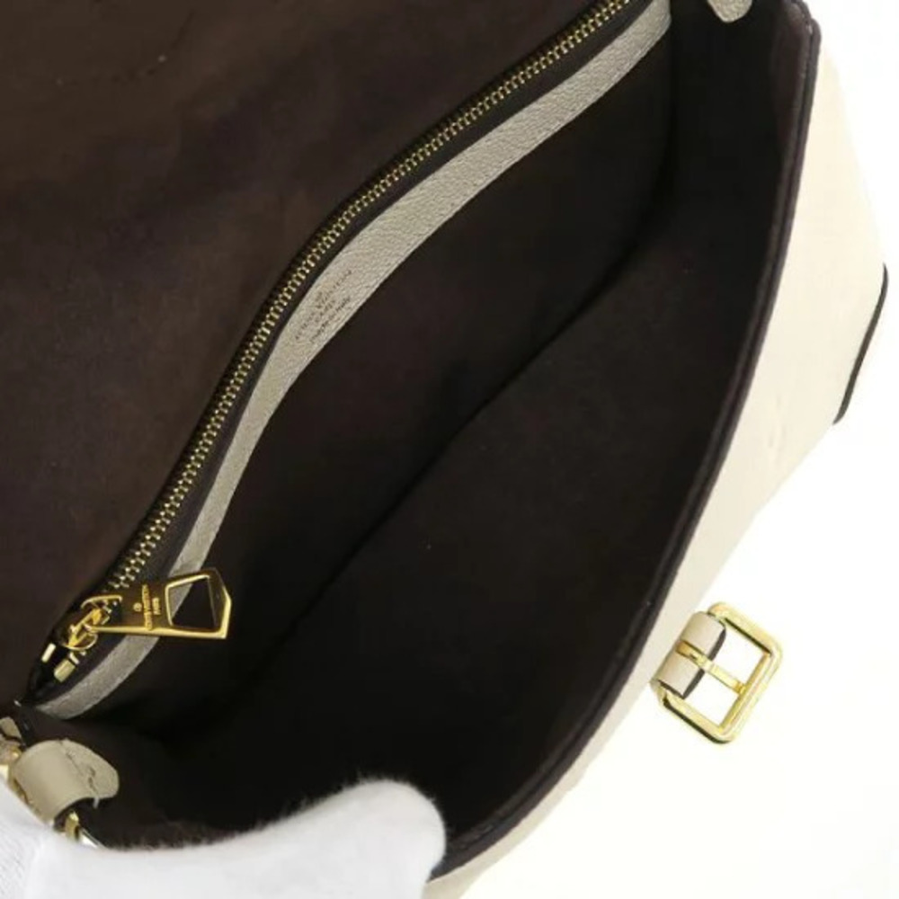 Louis Vuitton leather handbag Diane Empreinte Monogram embossed Brown